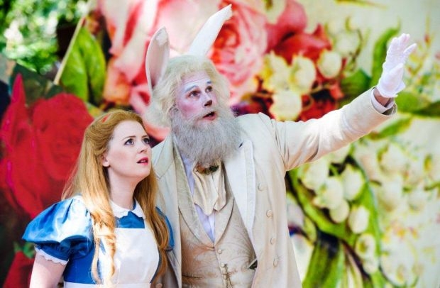 Ffleur Wyn as Alice and Joseph Cleverton as the Rabbit in Alice&#39;s Adventures in Wonderland (OHP)
