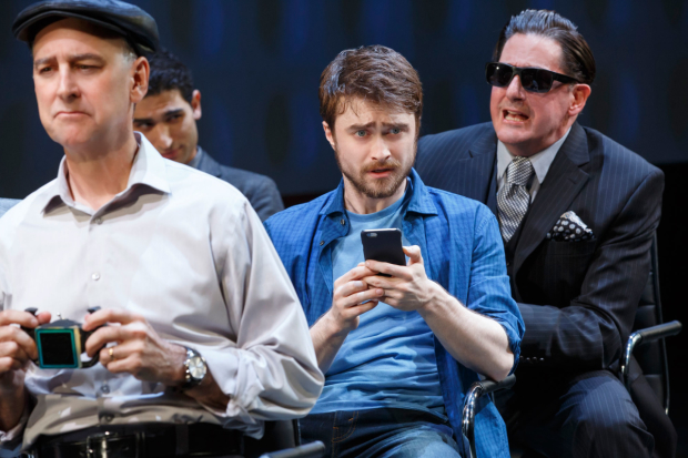 Daniel Radcliffe (center) and Michael Countryman, Raffi Barsoumian, and Reg Rogers in The Public Theater and Donmar Warehouse's co-production of Privacy