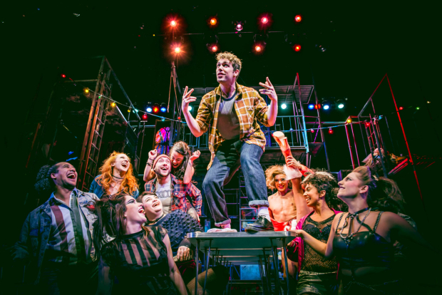 Billy Cullum (centre) as Mark with the cast of the UK tour of Rent