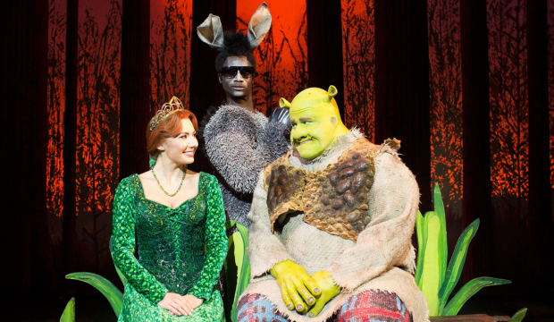 Dean Chisnall (Shrek) Bronte Barbe (Princess Fiona) and Idriss Kargbo (Donkey)