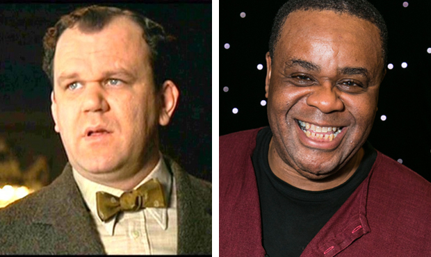 John C Reilly as Amos Hart and Clive Rowe