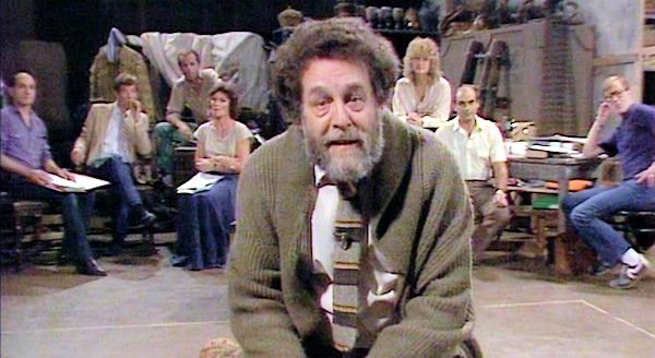 A screenshot of John Barton hosting the ITV series Playing Shakespeare
