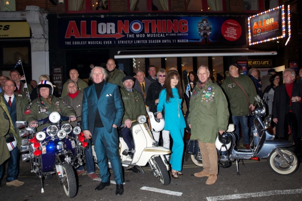 Mods arriving on scooters on Great Newport Street outside the Arts Theatre