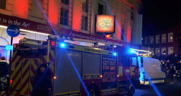 Piccadilly Theatre with fire service outside during the first preview. 