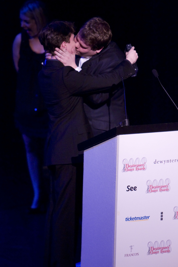  Daniel Radcliffe is kissed by James Corden on stage at the inaugural Whatsonstage.com Awards
