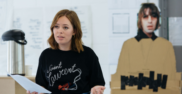 Tanya Burr in rehearsals for Confidence with a picture of Liam Gallagher