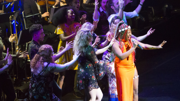 The cast of Hair performing at the 2018  WhatsOnStage Awards