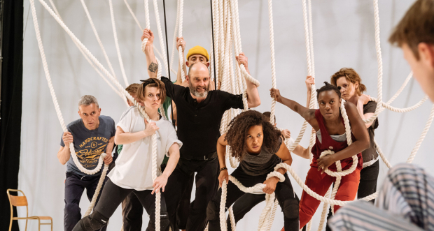 The cast of A Monster Calls using the set&#39;s ropes in rehearsals