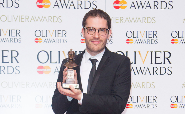 Robert Icke picking up an Olivier Award in 2016