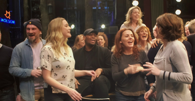 The current and new casts of Come From Away sing together on stage at the Phoenix 