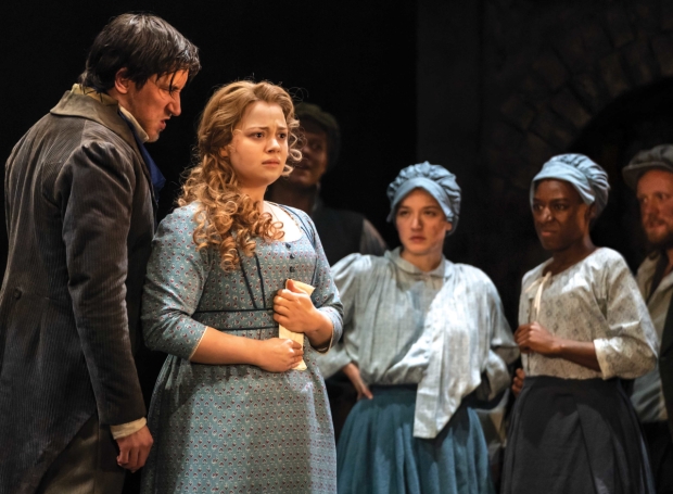Carrie Hope Fletcher as Fantine and the company 