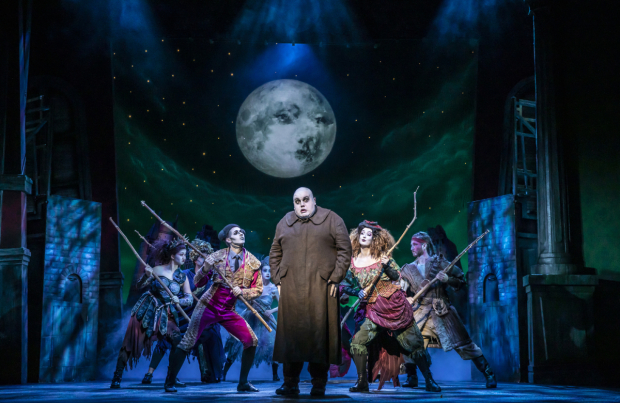 Scott Paige as Uncle Fester (centre) with the cast