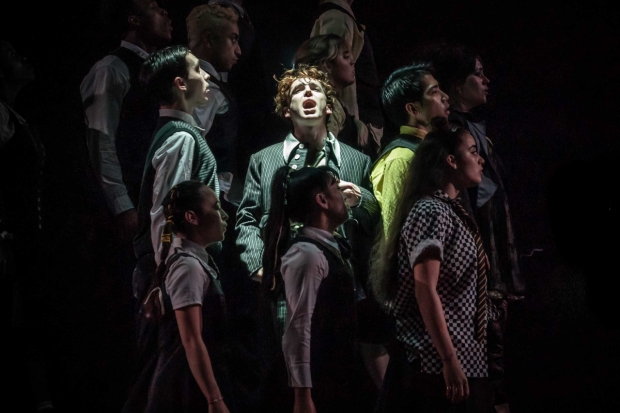 Laurie Kynaston (Melchior) and the company of Spring Awakening