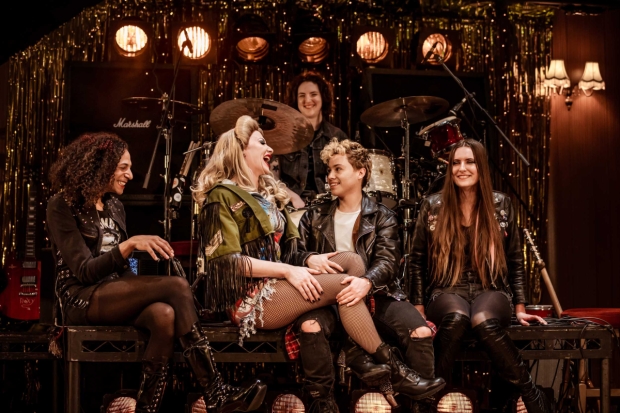 Divina De Campo (Hedwig) and Elijah Ferreira (Yitzhak) with Frances Bolley, Isis Dunthorne, and Jess Williams (The Angry Inch Band)