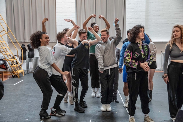 James Bennett (associate choreographer),  Millie O&#39;Connell (right) and the company