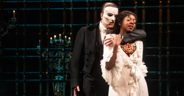 Ben Crawford plays the Phantom, and Emilie Kouatchou plays Christine in the Broadway production of The Phantom of the Opera