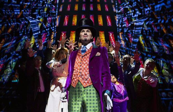 Golden ticket: Douglas Hodge (Willy Wonka) and the company