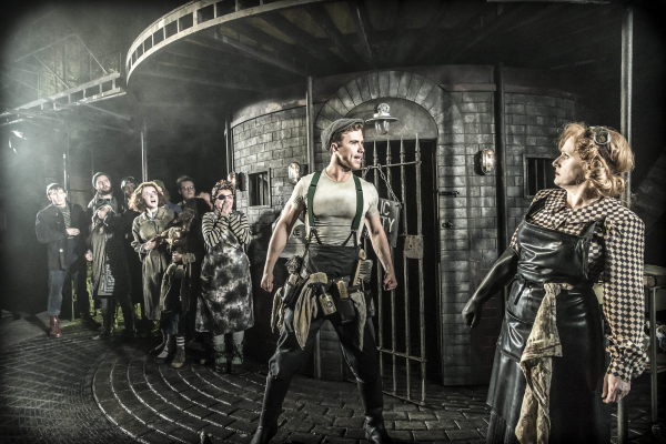 Richard Fleeshman, Jenna Russell and the cast of Urinetown