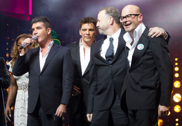 Simon Cowell on stage alongside Cynthia Erivo, Nigel Harman, Steve Brown and Harry Hill