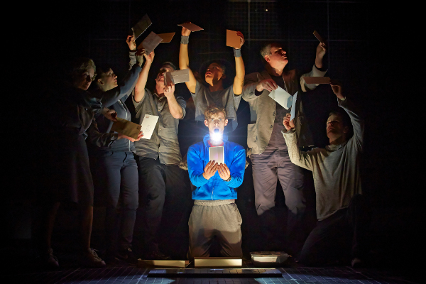 Luke Treadaway and company in the production at the Apollo Theatre
