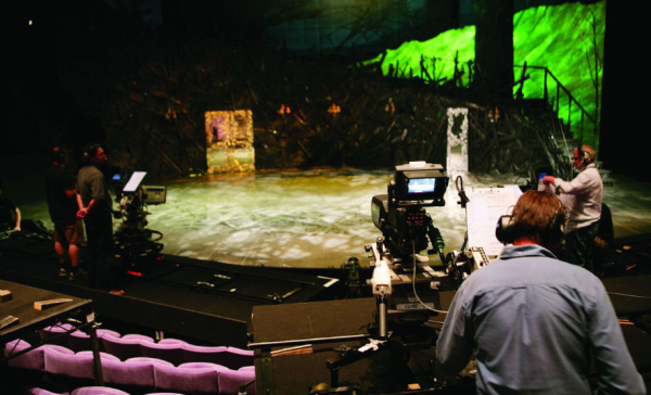 Complementing the live experience? Cameramen prepare to film a production at the National Theatre