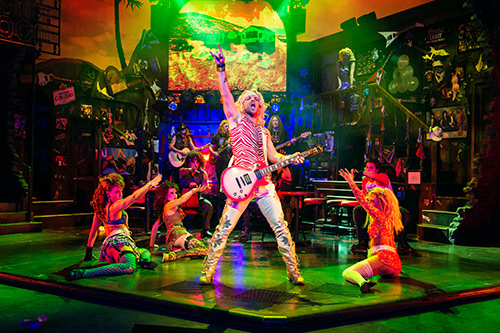 Ben Richards (Stacee Jax) and cast in Rock of Ages.