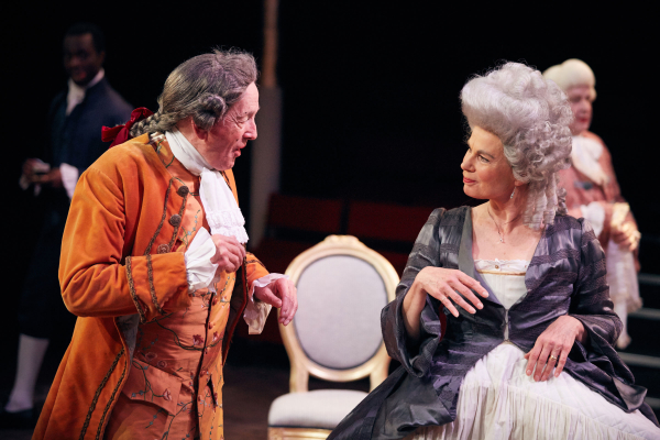 Benjamin Whitrow as Crabtree and Julia Hills as Lady Sneerwell