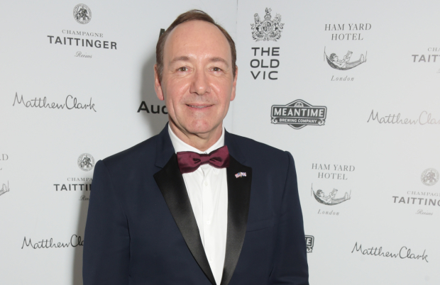 Suits you, Sir: Kevin Spacey attends a gala marking his tenure at the Old Vic