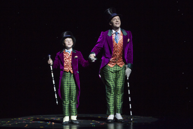 London Zachary Loonie (Charlie Bucket) and Jonathan Slinger (Willy Wonka) during the curtain call for the 2nd birthday of Charlie and the Chocolate Factory at the Theatre Royal Drury Lane, London, England on 25th June 2015. (Credit should read: Dan Wooller/wooller.com). Paid use only. No Syndication