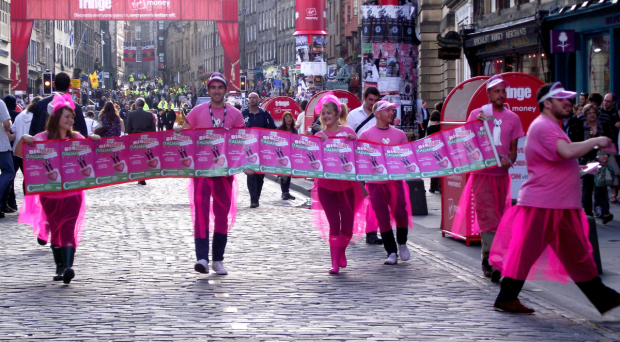Fringe performers take extreme measures to get attention on the Royal Mile in Edinburgh